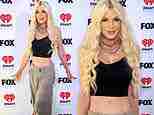 Ab-flashing Tori Spelling hits the red carpet as she’s seen for FIRST time since filing for divorce from Dean McDermott at iHeartRadio Awards