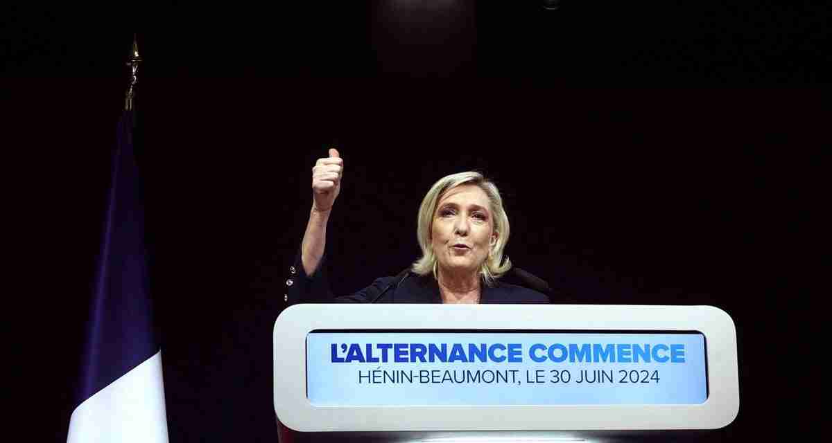 Marine Le Pen’s far-right National Rally party take the lead in first round of French election voting