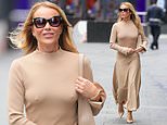 Amanda Holden goes braless in a nude midi dress as she leaves Heart FM after revealing her unlikely hidden talent