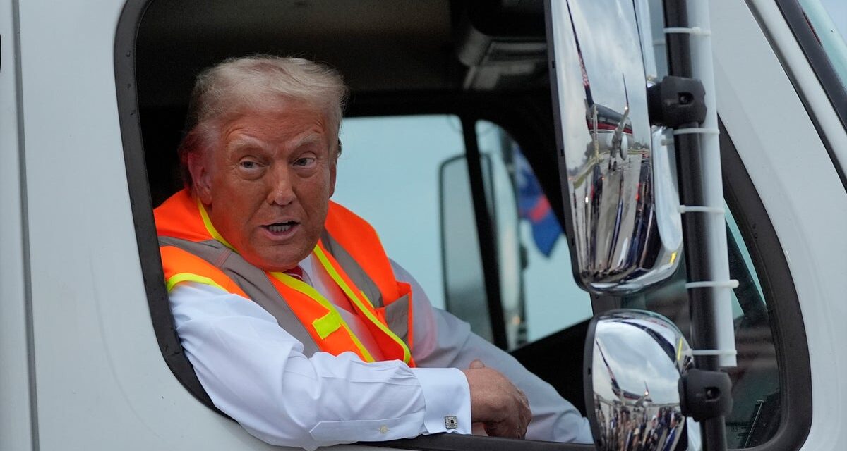 Trump prolongs uproar over Puerto Rico slur by driving garbage truck around in ‘total fail’ election stunt